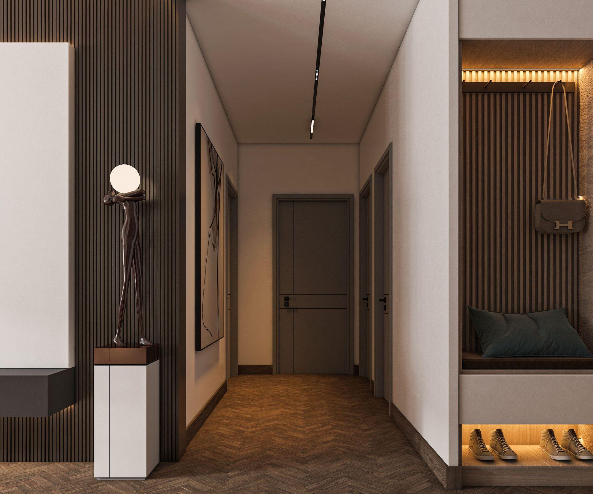 Walnut slatted corridor with a lit wardrobe nook and herringbone floor