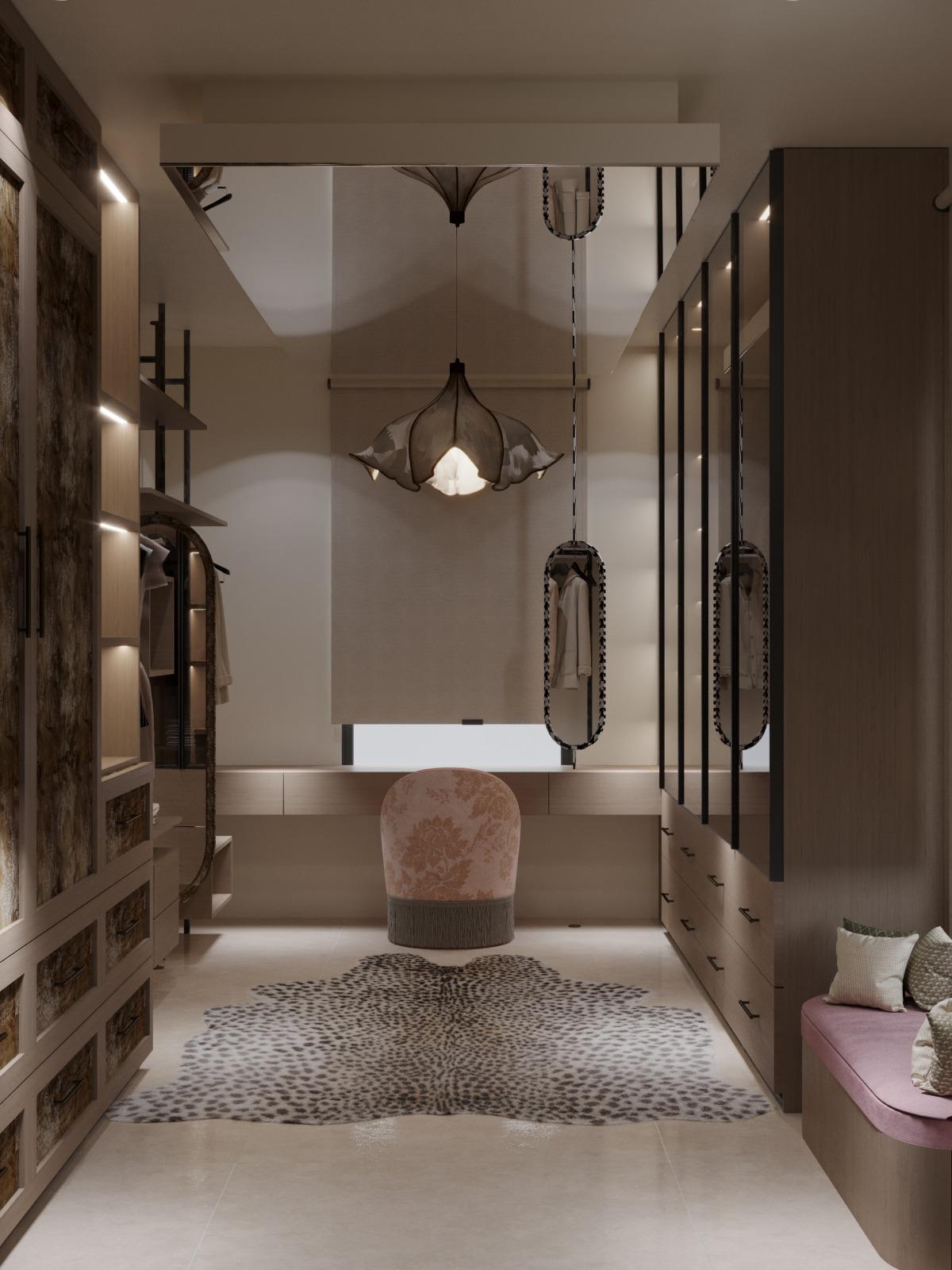 Finished walk in closet with a blush fringed vanity chair, leopard print rug, mirrored ceiling and lit wardrobes