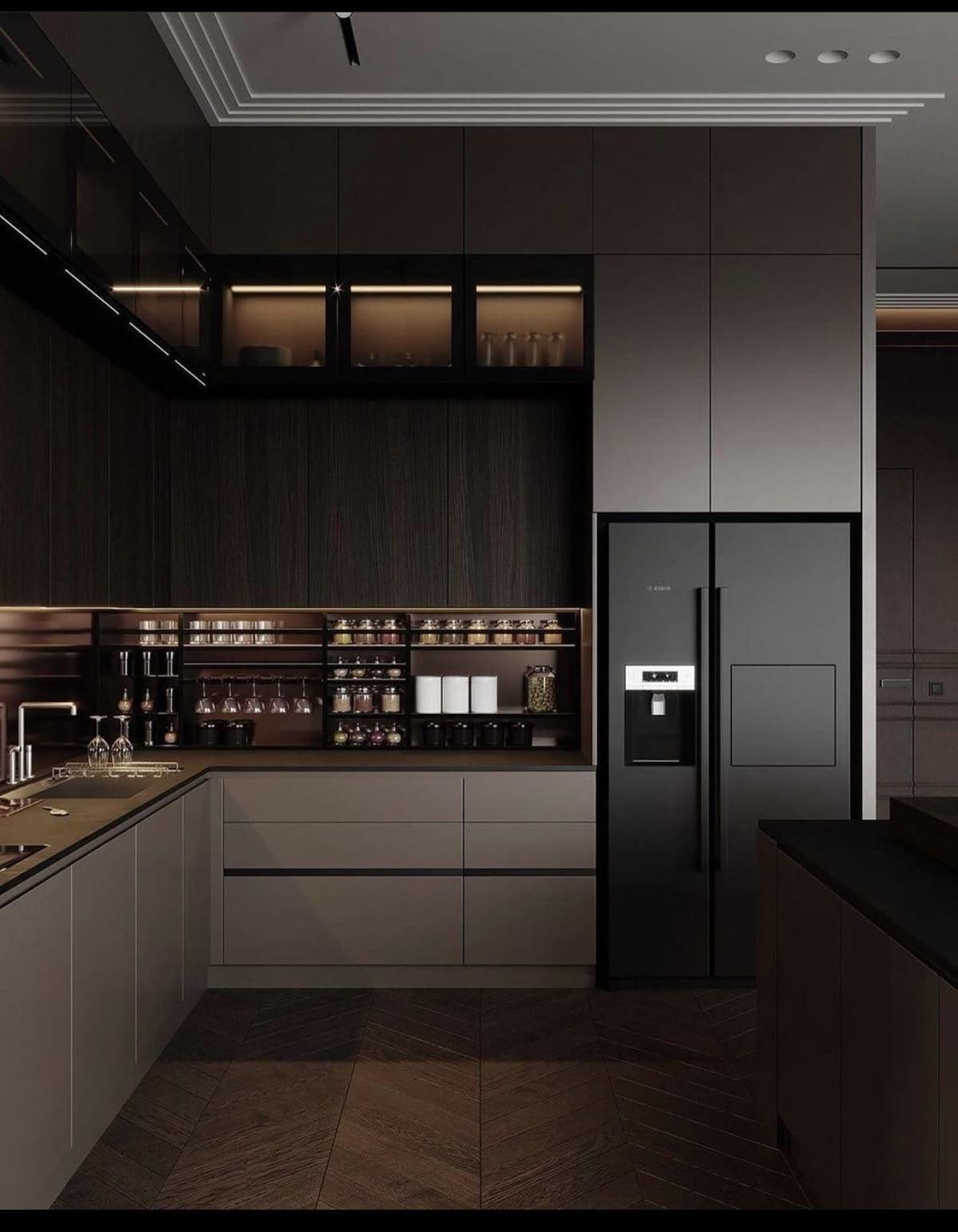 Dark mocha kitchen with lit display cabinets and a chevron timber floor
