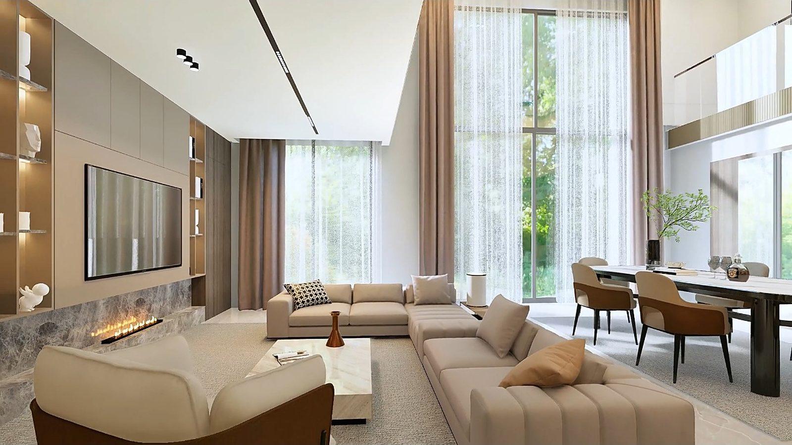 Villa living room with floor to ceiling windows, a stone fireplace and layered seating
